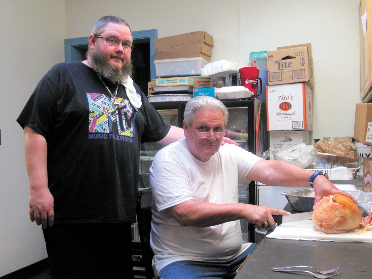 CLASSIC CHEFS: The father and son tandem of Bill Justice and his son Chris received rave preparing and cooking last Thursday’s Oakland Beach Firemen’s Club Thanksgiving Dinner. (Warwick Beacon photos by Pete Fontaine)